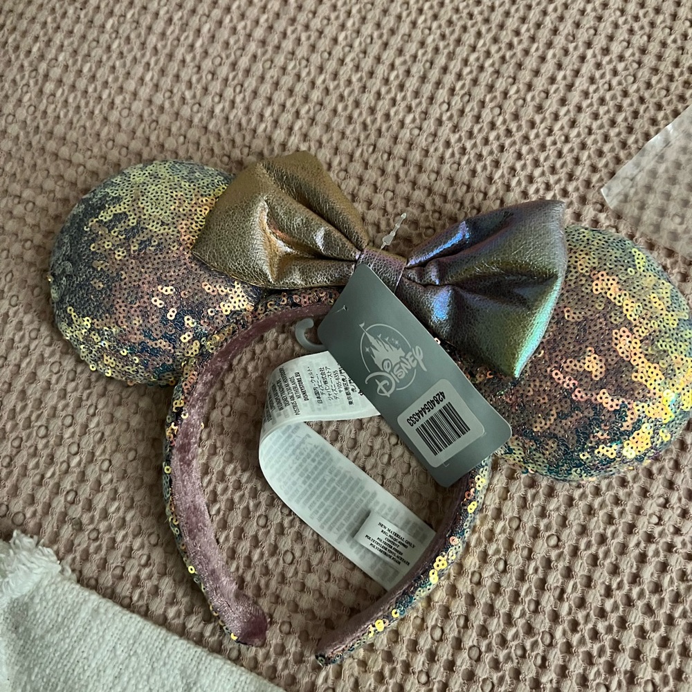 Walt Disney world 50th ear descent ears.